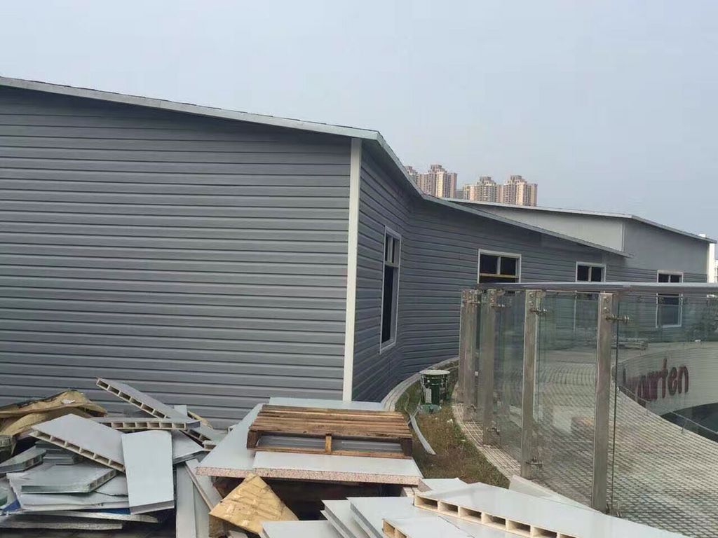 贵州承接pvc外墙挂板工程贵州批发别墅木纹pvc外墙装饰板